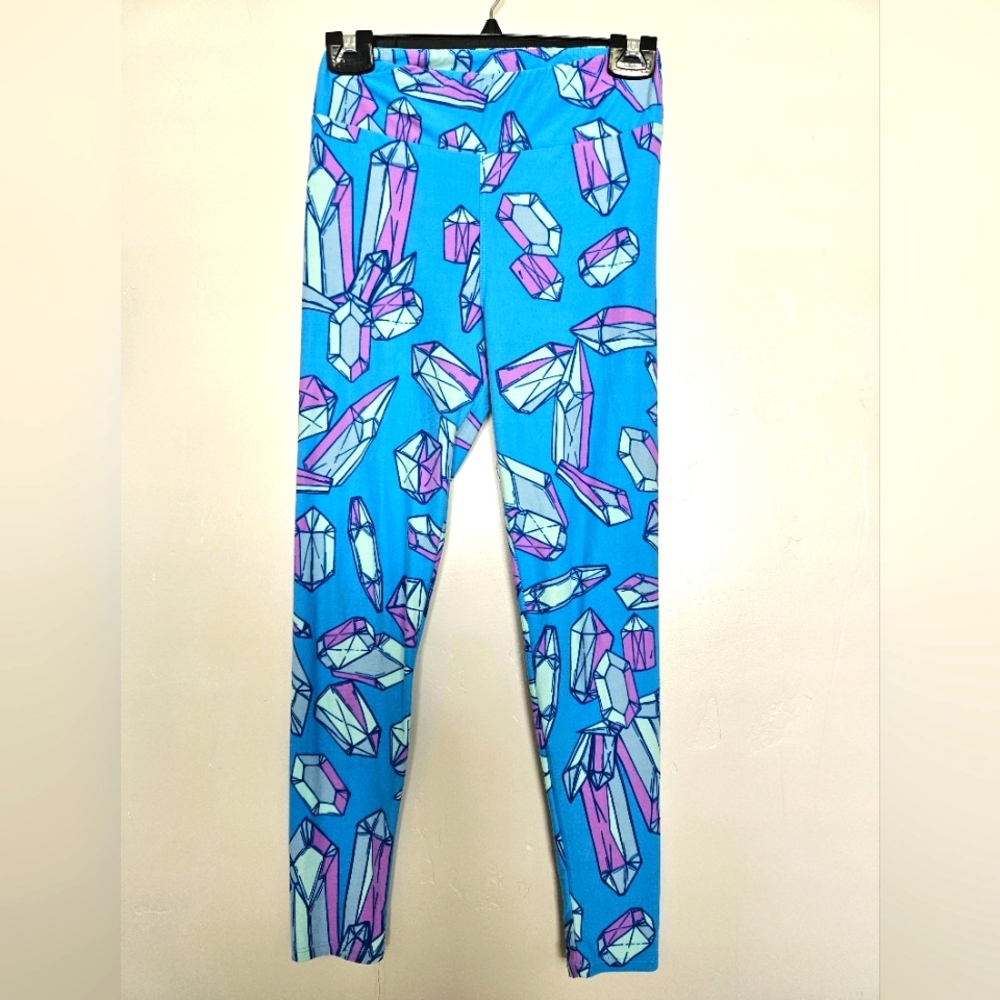 Lularoe one size crystal gem stone leggings on blue background